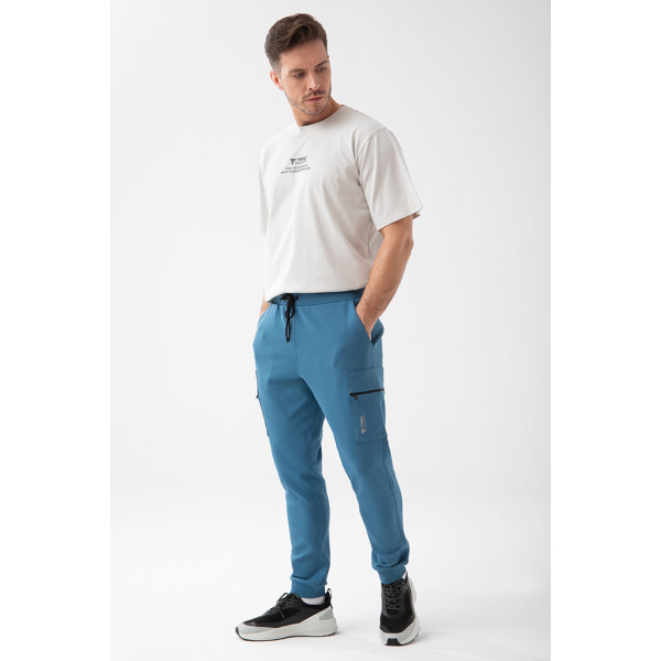 Niebieskie spodnie dresowe męskie TW BASIC PANTS 192 M BLUE