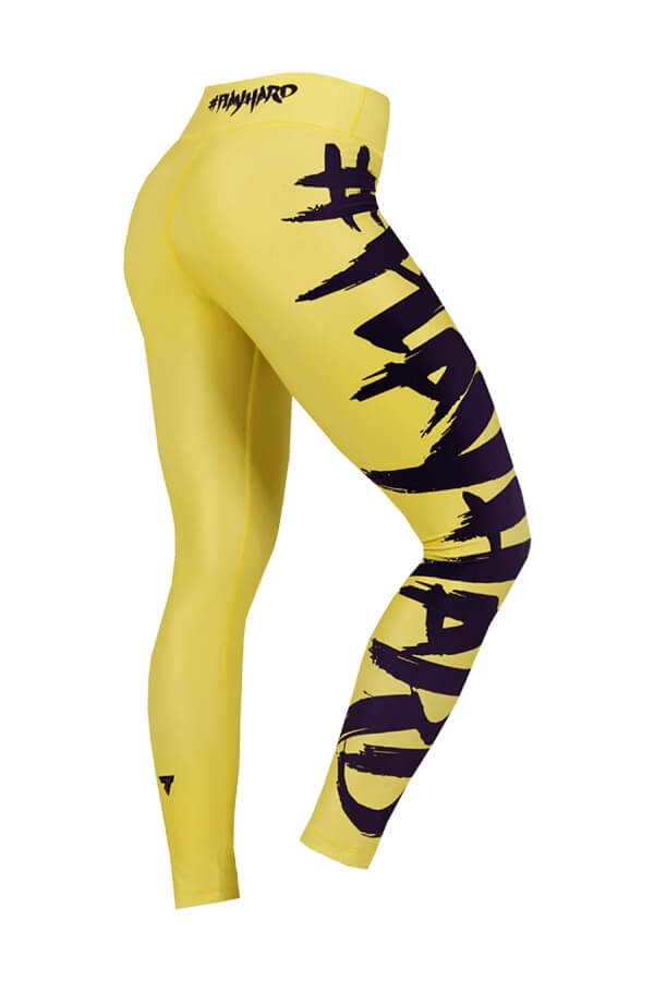 Żółte legginsy damskie z czarnym napisem TRECGIRL 015 https://www.trec.pl/media/catalog/product/l/e/legi